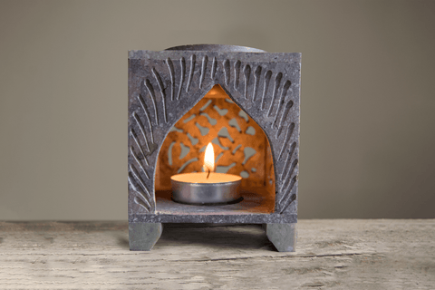 Oil burner with candle lit